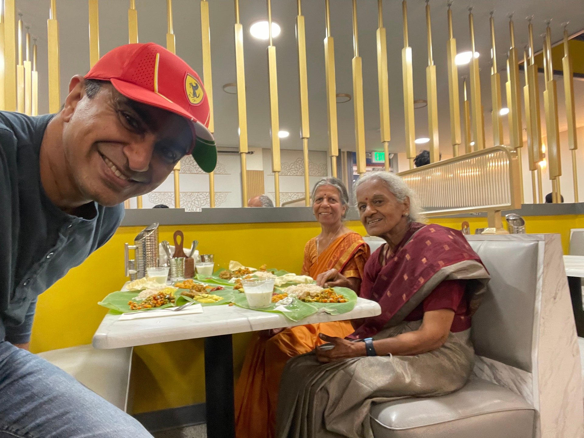 Ajit Banerjee celebrating Onam over sadhya with his mother and a friend