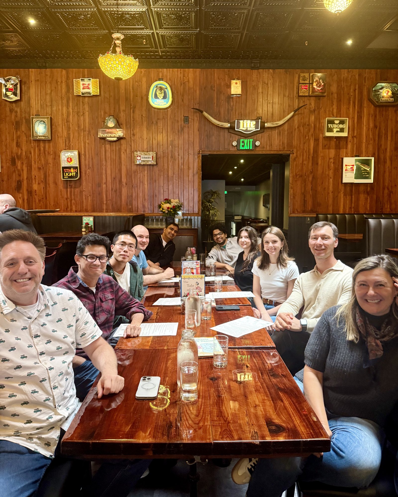 The SageOx team around a table at a team lunch